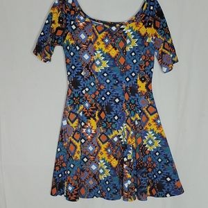 Multi colored mini dress. Aztec print detail